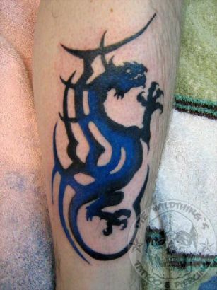 Tribal Dragon Tattoo Design On Leg